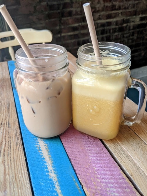 little choc apothecary latte and fresh orange juice