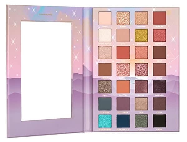 a large purple and pink eye makeup palette from pacifica with a mirror