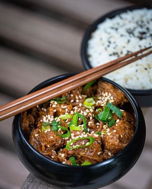 vegan japanese dish and rice with chopsticks balancing on the bowl at breathe paris