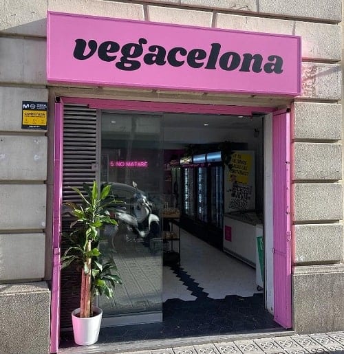 the hot pink outside of the vegan market vegacelona in barcelona