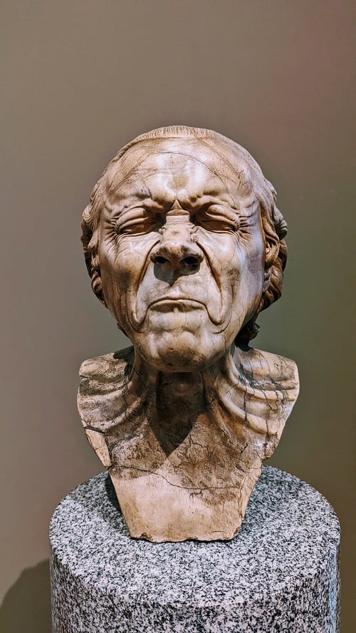The Getty Art Museum Smirking Man Sculpture
