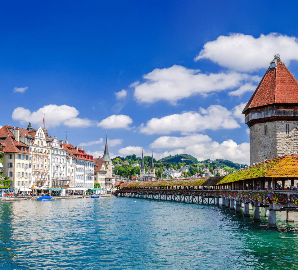 bright and sunny day in lucerne's old town with the chapel bridge