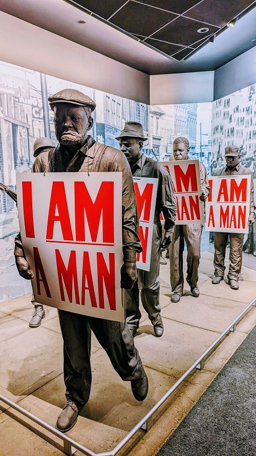 i am a man exhibit with men protesting and wearing signs in national civil rights museum