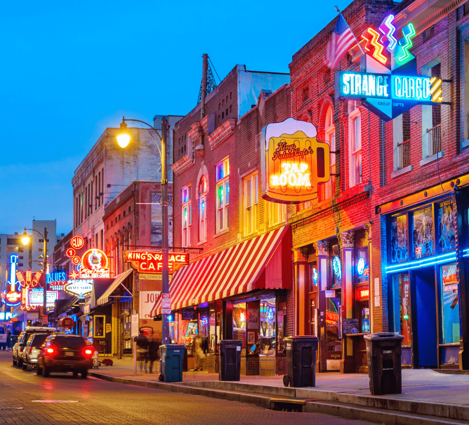 famous beale street at night with neon lights aglow in memphis