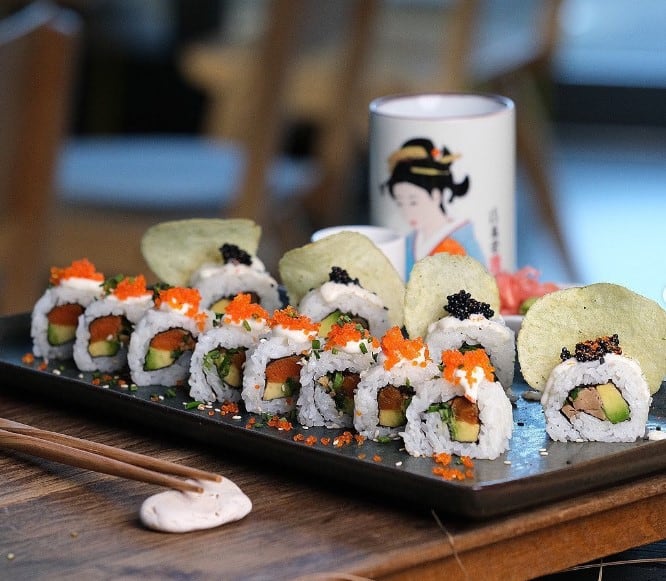 specialty vegan sushi rolls with a japanese mug at maki maki in cologne