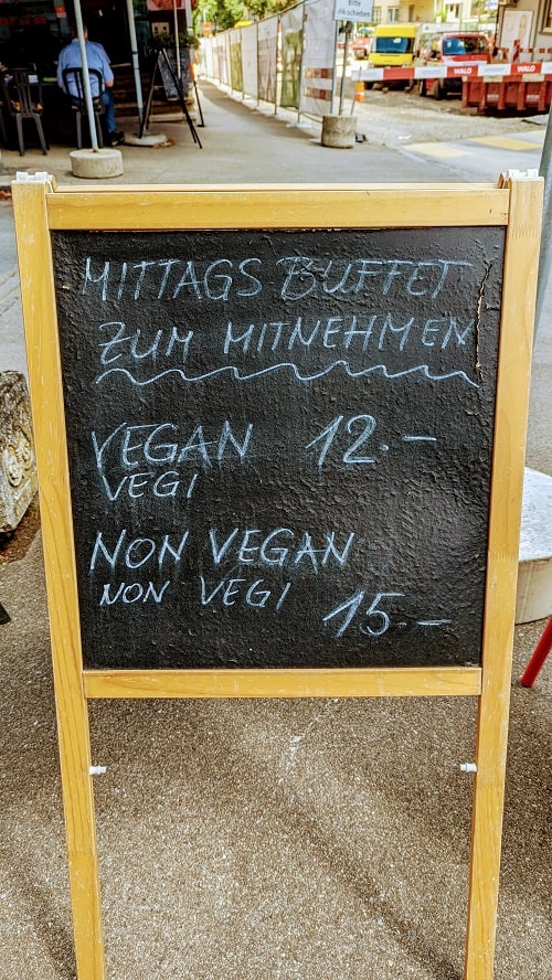 sign for vegan and non vegan food in bern city center