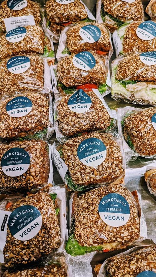 prepared vegan sandwiches in a row at coop market in bern