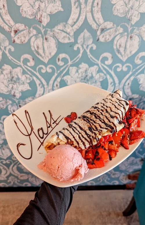 vegan waffle with chocolate sauce and strawberry sorbet from wonder waffel bern
