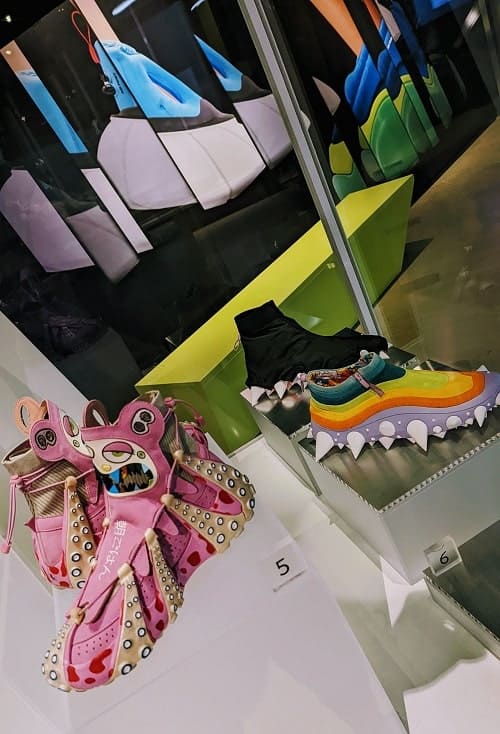 hot pink and rainbow shoes in the innovative shoe collection at bata shoe museum in toronto