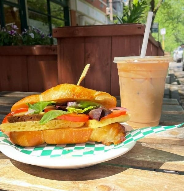 vegan croissant breakfast sandwich and chocolate smoothie at fancy plants in chicago
