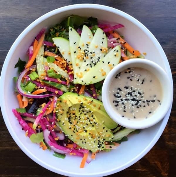 vegan veggie bowl with avocado, cabbage, and cucumbers at ground control in chicago