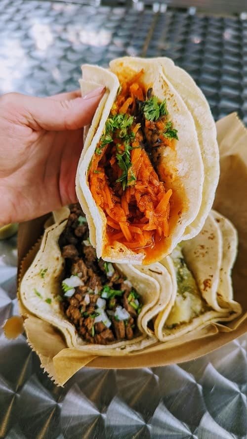 vegan tacos filled with carrots, and veggies from succulent tacos in nashville