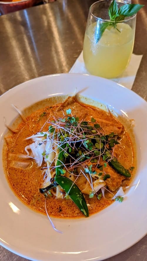 vegan kari hor fun spicy coconut curry with rice noodles from fat choi in toronto