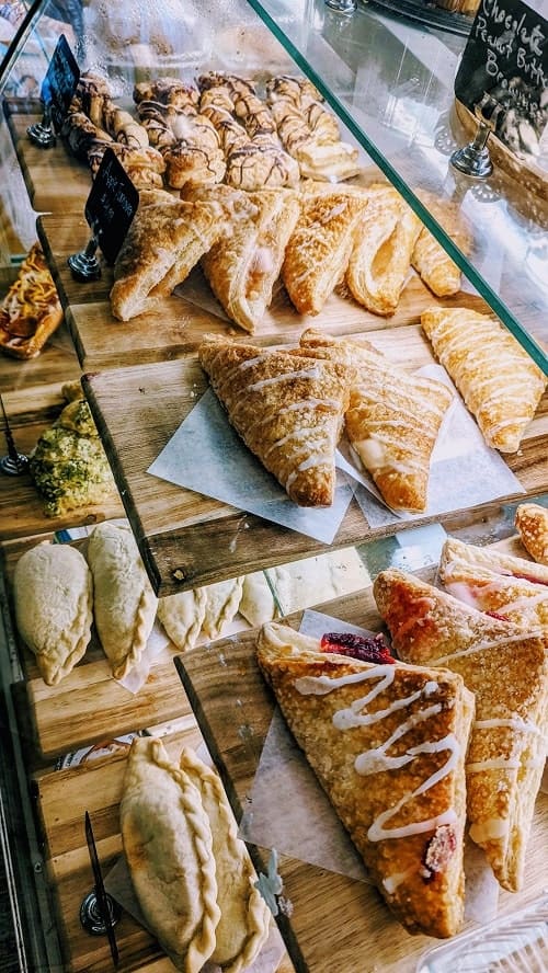 lineup of vegan pastries and fruit turnovers from the vegan danish bakery in toronto