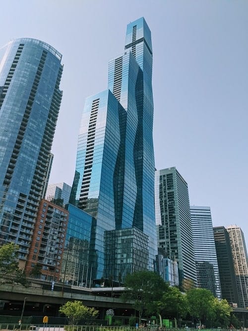 view of building with wavy architecture from the chicago river