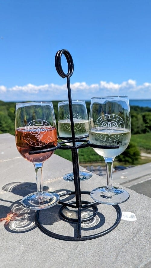 tasting flight of three vegan wines on the patio of chateau chantal in traverse city