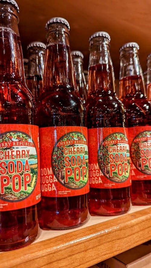 bottles of red cherry soda  at cherry republic in traverse city