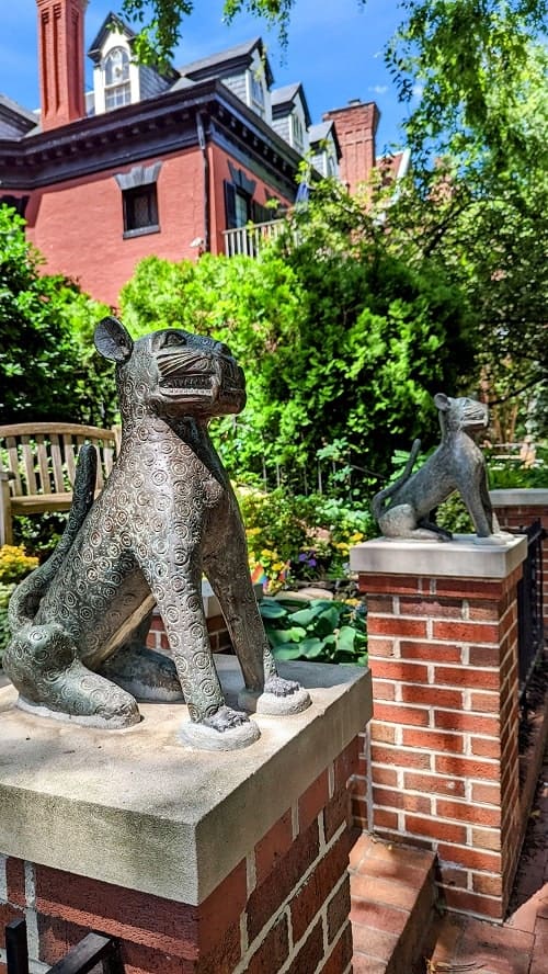 cat gargoyles marking the entrance to a historic dc home