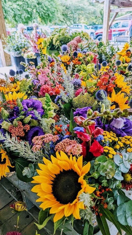 display of bright wildflowers at ithaca farmers market