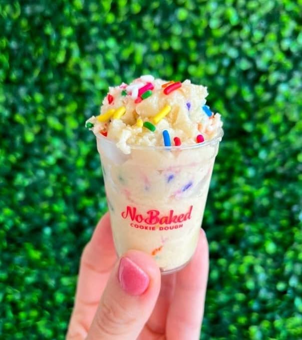 small cup of vegan cookie dough with sprinkles from no baked in nashville