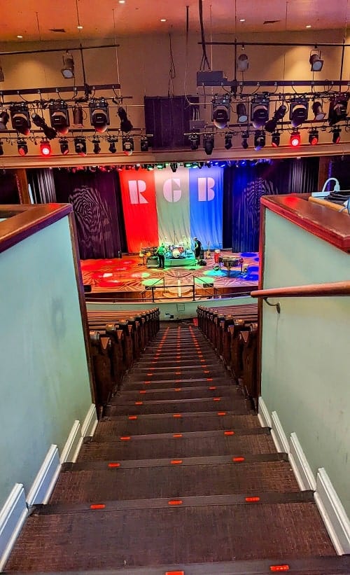 stair case leading down to the stage of the ryman auditorium