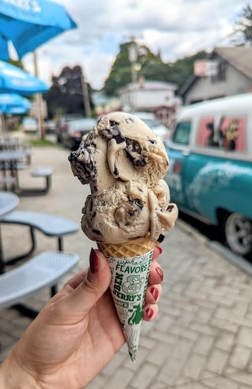 two scoops of vegan ice cream on a cone from ben and jerry in watkins glen