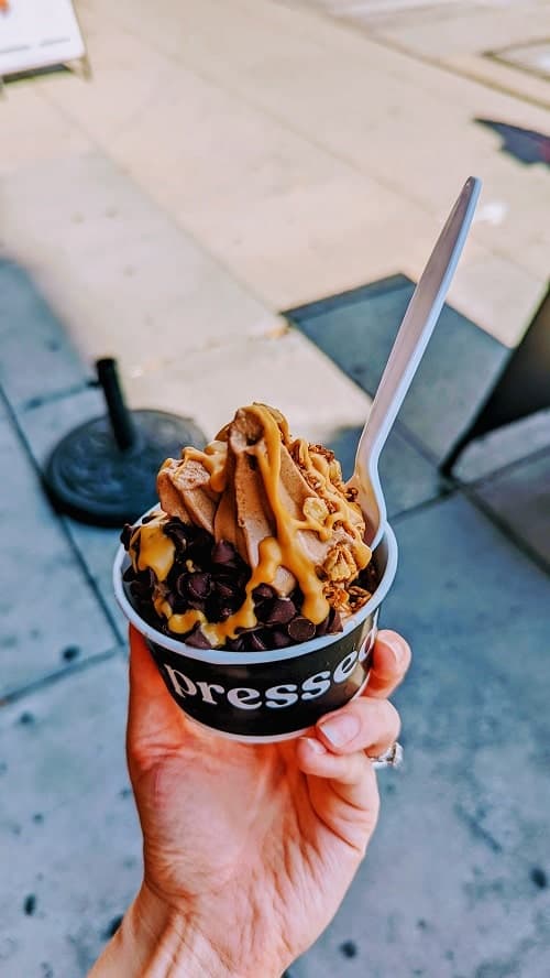 chocolate vegan soft serve with almond butter drizzle and chocolate chips from pressed in dc