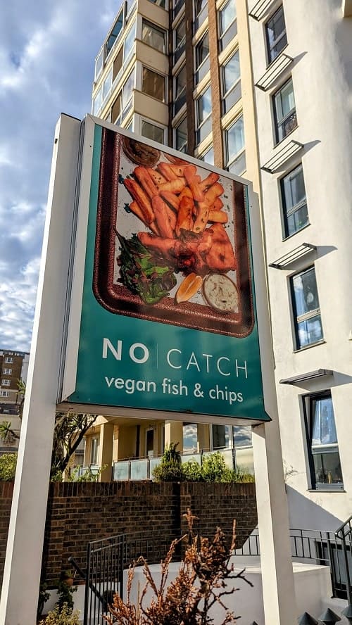entrance sign to no catch fish-free seafood restaurant in brighton