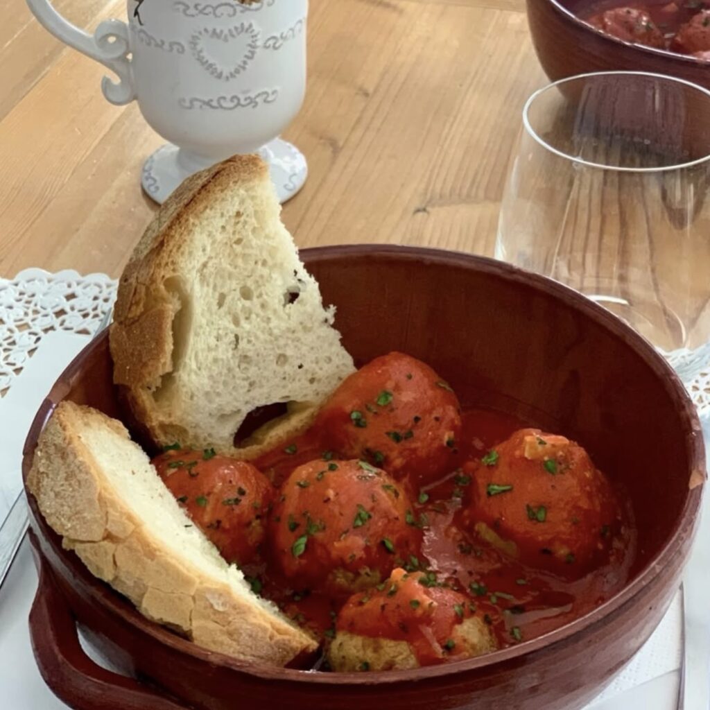 Vegan meatball dish with bread.