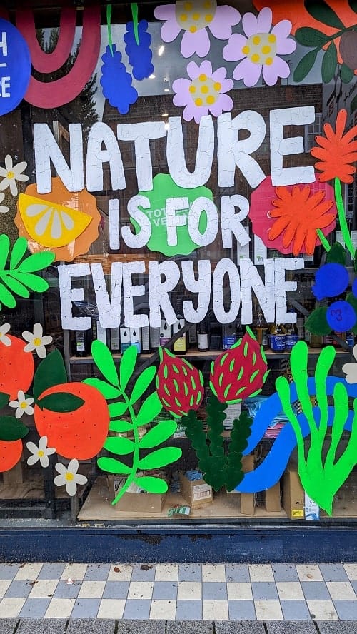 brightly colored mural that says nature is for everyone