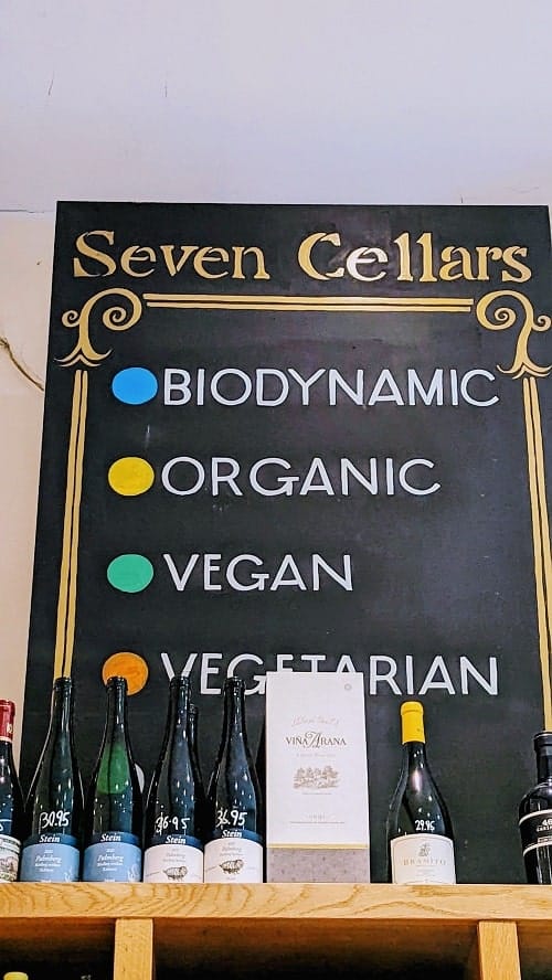 seven cellar black wine key that shows which wines are biodynamic, organic, vegan, and vegetarian with colored dots