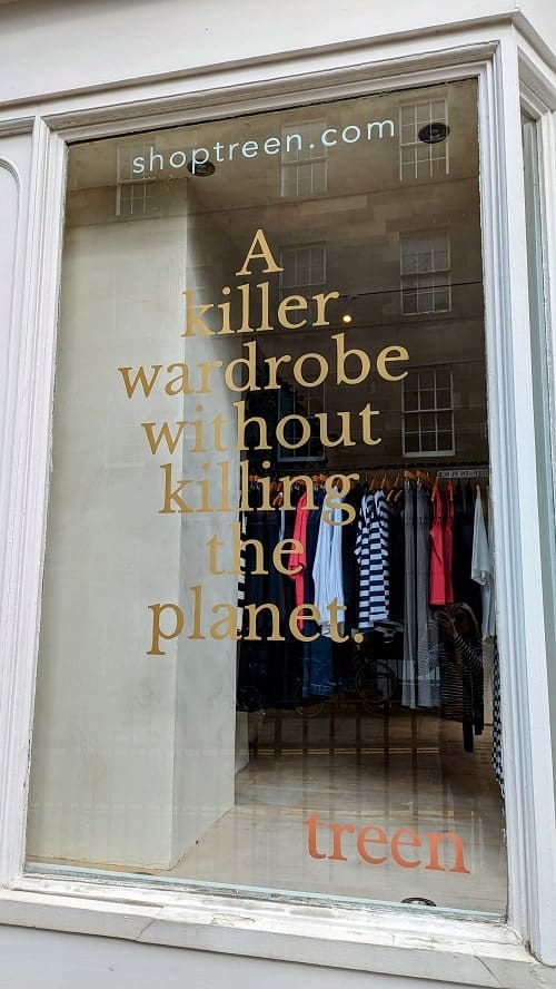 the outside of the sustainable clothing store treen that says a killer wardrobe without killing the planet