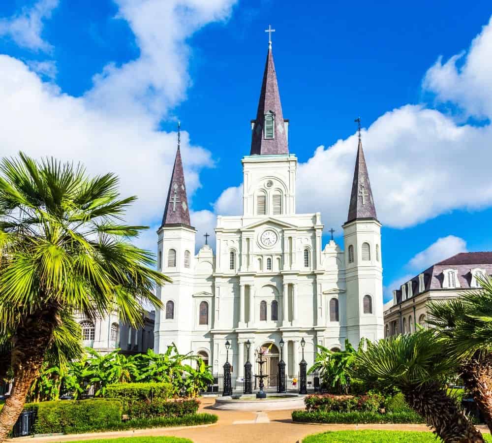 the st louis cathedral in the heart of new orleans on a bright and sunny day