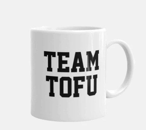 white mug that says in black print, team tofu