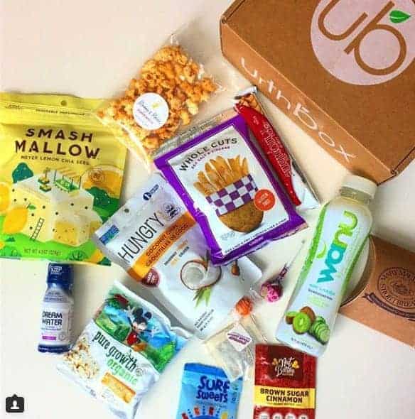 vegan snack box with popcorn, snacks, drinks, cookies, from the snack company urth