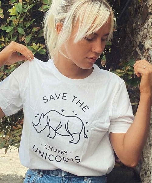 a white tee that says save the chubby unicorns with a picture of a rhino from vegan outfitters