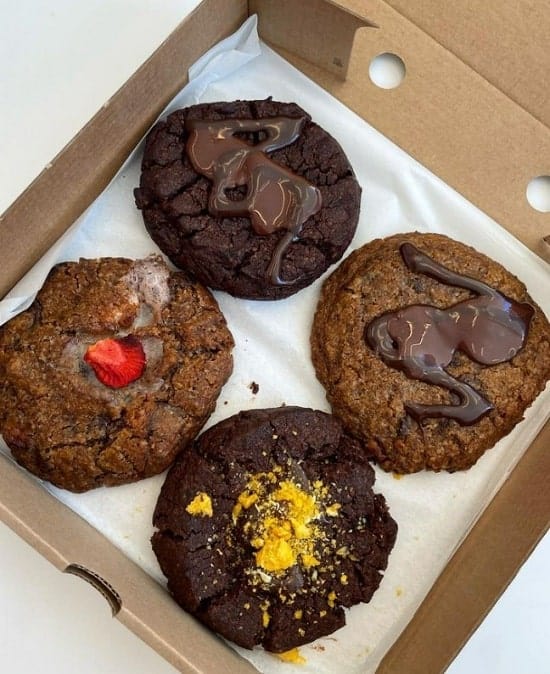 a box of four vegan and gluten free chocolate cookies from the after school cookie club in london