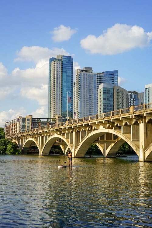 congress bridge with downtown austin in the background on a sunny day