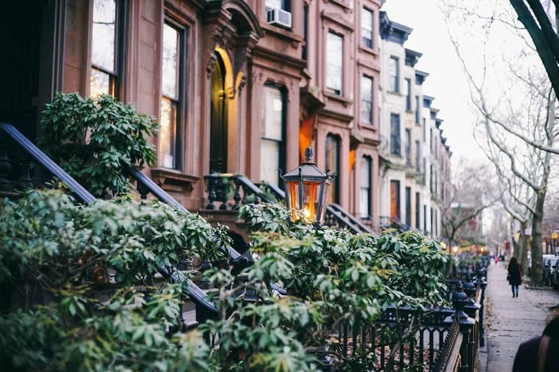 charming brownstone homes along a tree lined street in brooklyn heights