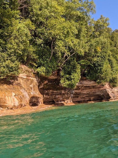 view from the kayak of the pictured rocks national lakeshore cliffs