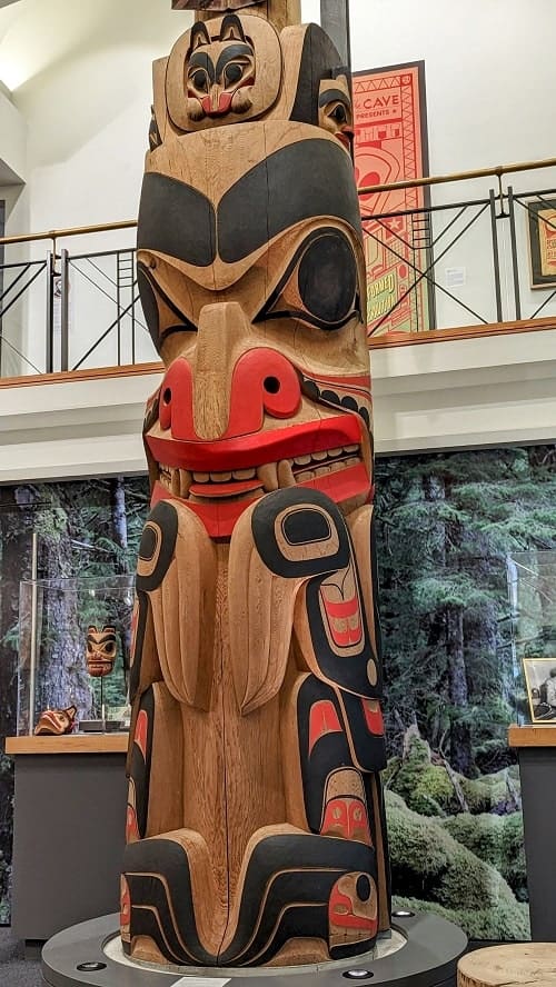 totem pole art at the bill reid art gallery in vancouver
