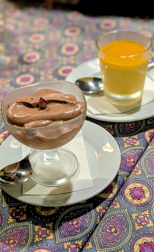 two small dessert glassed filled with chocolate and lemon mousse at psi restaurant in lisbon