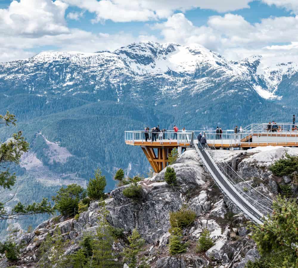 the sea to sky viewing platform perched above the snowy howe sound in british columbia