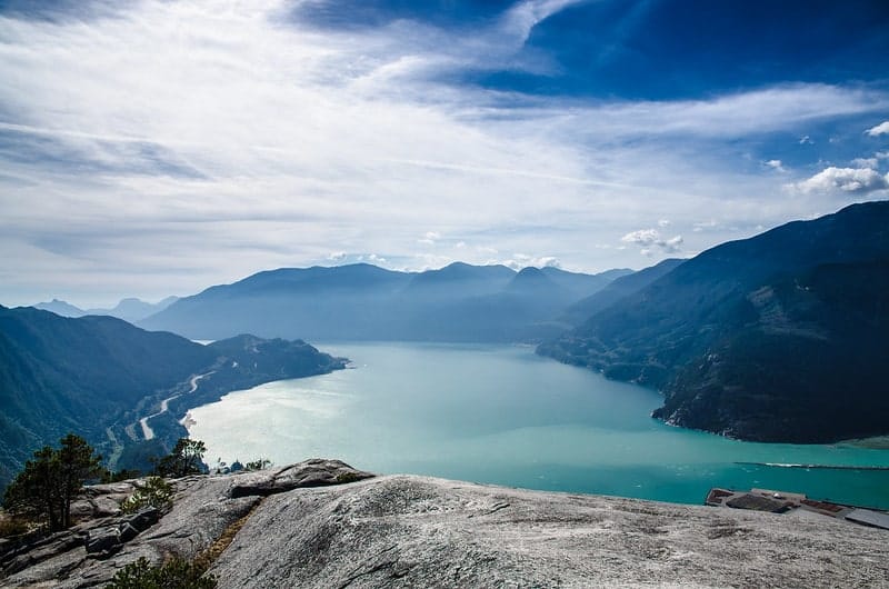 view of the gorgeous blue howe sound from the peak of stawamus chief on a vancouver day hike trip