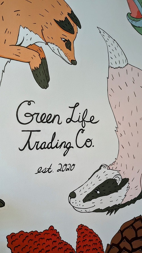 green life trading mural inside store in madison