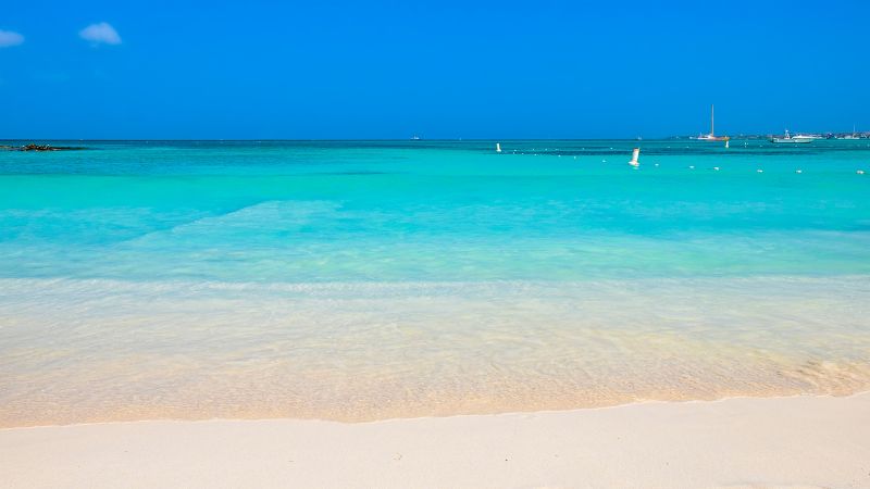 pristine white sands and turquoise waters of eagle beach in aruba