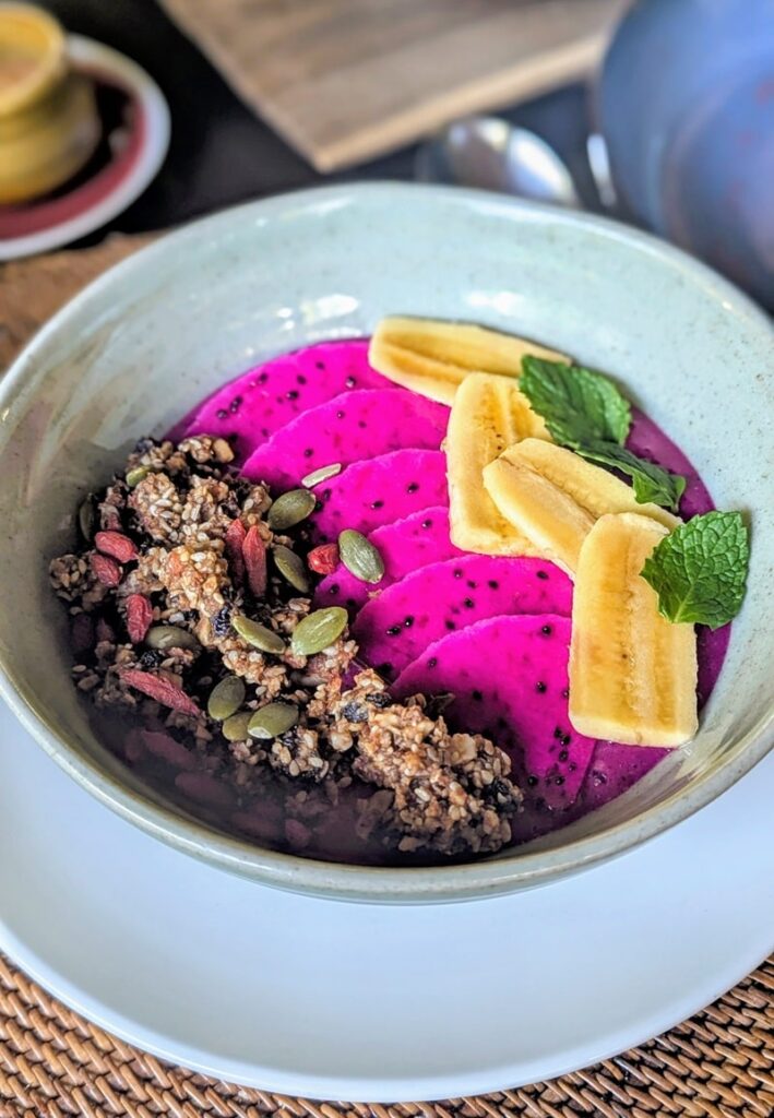 bright purple dragon fruit bowl with granola at fivelements retreat