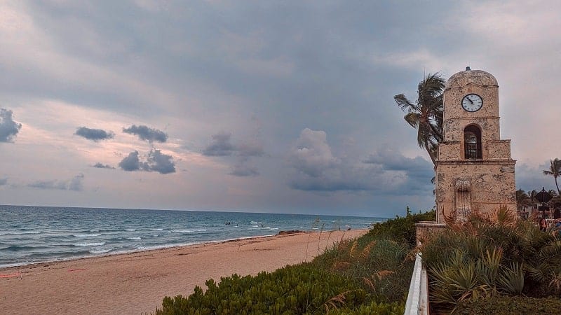 palm beach and worth clock tower on a slightly cloudy day in palm beach