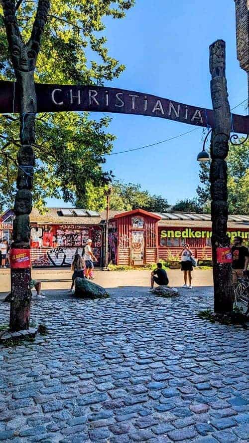 the wooden entrance sign to Freetown Christiania in copenhagen