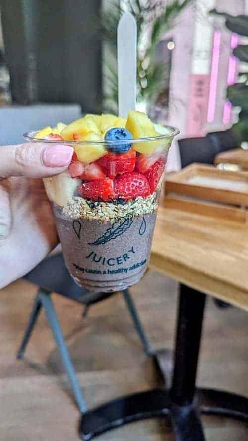 acai bowl topped with fresh fruit at base v juicery in florence
